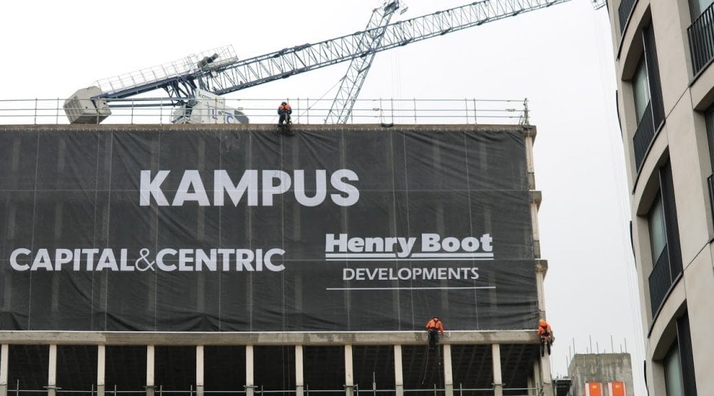 A large installation with the words kampus capital central on it.